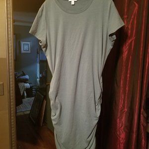 two dark green dresses